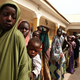 Girls rescued by Nigerian soldiers from Islamist militants Boko Haram at Sambisa Forest line up to collect donated clothes at the Malkohi refugee camp in Yola, Nigeria, on May 5, 2015.
EMMANUEL AREWA/AFP/Getty Images